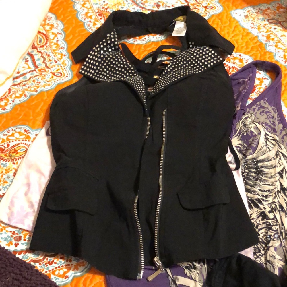 Black zip up vest/halter top with rhinestones on collar detailing on the back
